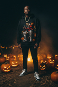 Male model wearing The Daily Dead Freddy Pumpkin Patch hoodie